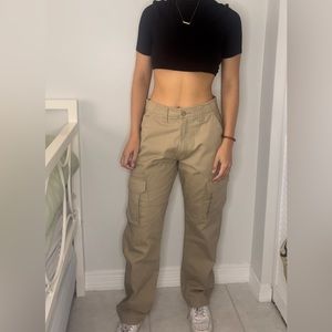 tan mid to low waist full length cargo pants with pockets